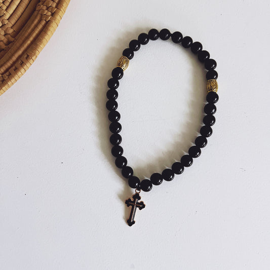 Pulsera de oración de 33 cuentas de ébano con espaciadores largos dorados y cruz esmaltada en negro